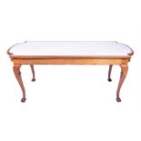 A large Edwardian mahogany dressing table base with fitted glass top, raised on cabriole supports