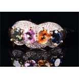 A 14ct yellow gold, diamond, and multi-coloured sapphire ring set with oval cut blue, orange,