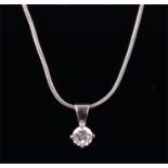 An 18ct white gold and solitaire diamond pendant set with a round brilliant-cut diamond of