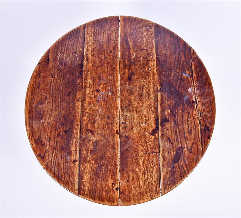 An 18th century or later oak cricket table the circular top on chamfered legs joined by - Image 2 of 2