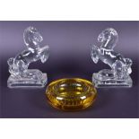 A pair of early 20th century pressed glass horse bookends in the manner of L E Smith, each form as a