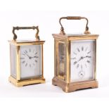 Two early 20th century carriage clocks the smaller with 'R & Co made in Paris' engraved to its