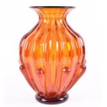 A large 1960s-70s Murano amber glass vase by or in the manner of Seguso, with a vertically ribbed