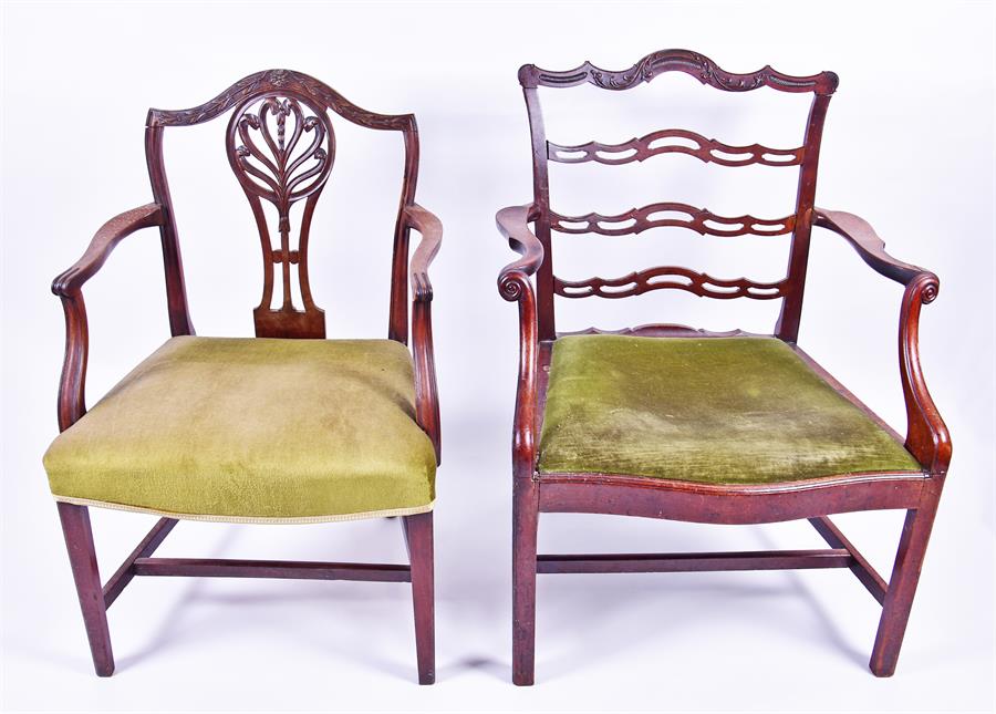 A George III mahogany pierced ladder back elbow chair with scroll design to top and drop-in