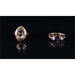 A 10ct yellow gold and amethyst ring set with a fancy heart-cut deep purple amethyst, size M,
