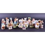 A collection of 26 F. Warne & Co Beswick Beatrix Potter figures comprising Amiable Guinea Pig,