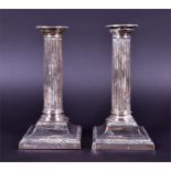 A pair of Edwardian silver candlesticks Sheffield 1907, by Hawksworth, Eyre & Co. Limited, of