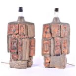 A pair of 1960s-70s Bernard Rooke pottery large table lampbases each with moulded high relief