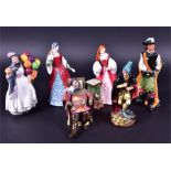 A collection of six Royal Doulton figures comprising: 'The Foaming Quart' (HN 2162), 'The Pied