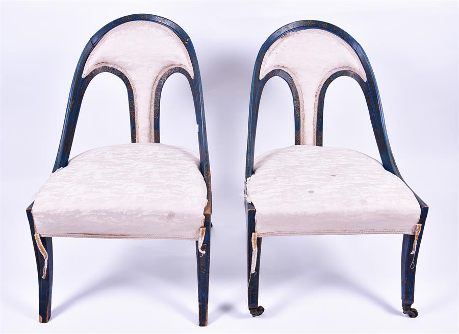A pair of Victorian upholstered salon chairs in the chinoiserie taste each with blue and gilt