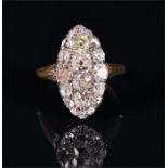 A late 19th / early 20th century yellow gold and diamond ring the navette-shaped mount set with