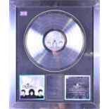 A framed and glazed Queen presentation record, Greatest Hits III with presentation script ' In