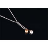 An 18ct white gold, diamond, and pearl drop pendant necklace suspended with a white pearl and a