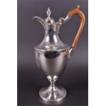 A George III silver ewer by Hester Bateman London 1786, the vase shape body engraved with a coat