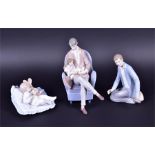 Four Lladro figure groups to include model 6504, 'Daddy's Blessing', 23 cm high, 6791 'Taking A