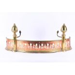 A 19th century brass and copper fire guard of curved form with pierced aesthetic-style foliate