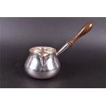 A George III silver brandy saucepan with turned fruitwood handle by 'PB', London 1806, of plain