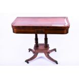 A 19th century rosewood veneered folding card table the top and frieze with brass inlay supported on