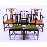 Two Georgian mahogany carver chairs each with splat backs and drop-in upholstered seats, together