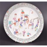An 18th century Chinese Qianlong period famille rose plate with pierced rim and decorated with an