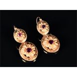 A pair of late 19th / early 20th century yellow gold and almandine garnet drop earrings each