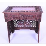 A late 19th / early 20th century Chinese hardwood writing table the rectangular top inlaid with