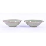 A Pair of Chinese crackle glaze celadon bowls  of plain form with slight everted rims, 28cm diameter