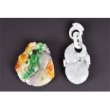 Two Chinese jadeite pendants, one carved with a chilong feeding off vegetation with multi-colour