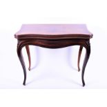 A good 19th century French card table with mahogany base and rosewood veneered top of bombe form,