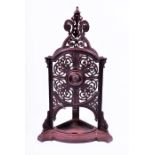 A good quality Victorian cast iron corner stick stand  classically styled with a central roundel
