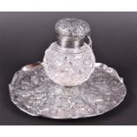 A Victorian silver mounted cut glass inkwell with dish base London 1891 by Charles Boyton, the hob-