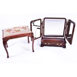 A George III style mahogany dressing table mirror and stool  the hinged triptych mirror on two-