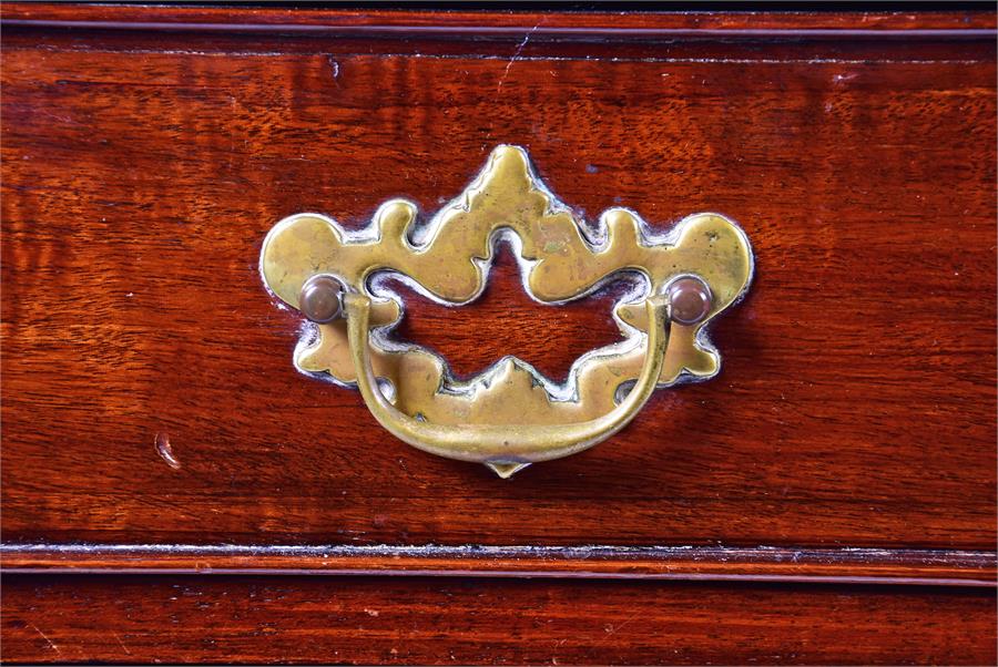 A small Georgian mahogany chest of four graduated drawers with brass handles and escutcheons, on - Image 2 of 4