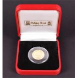A Peter Rabbit 100 years Gibraltar commemorative gold coin 1/5 oz, 6.2 grams in a fitted box with