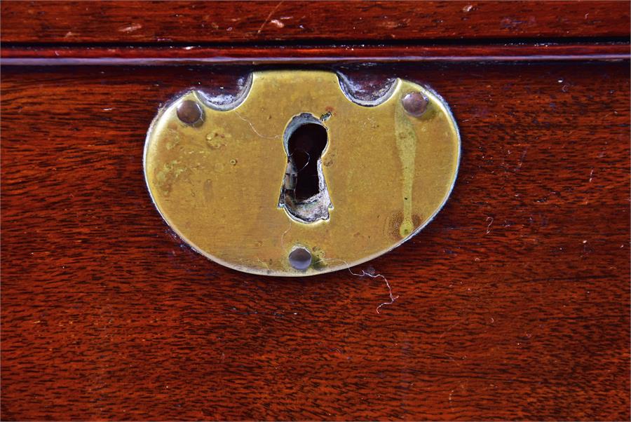 A small Georgian mahogany chest of four graduated drawers with brass handles and escutcheons, on - Image 3 of 4