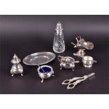 A quantity of silver plated items to include a Mappin & Webb oval plate a pair of three footed