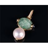 An 18ct yellow gold, diamond, emerald, and South Sea pearl pendant by Andrew Clunn, set with a round