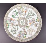A late 19th century Chinese Famille Verte porcelain dish the central roundel with exotic birds