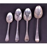 Four 18th century silver spoons  including a dessert spoon by David Willaume, London 1715, two