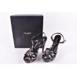 A pair of Saint Laurent Sandalo ladies shoes size 40, in black leather with floral decoration,
