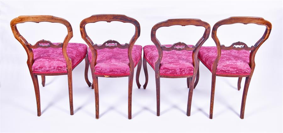 A set of four Victorian yoke back chairs  with red upholstered overstuffed seats on front cabriole - Image 2 of 2