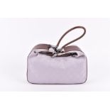 A Gucci Monogram Hobo bag in pale lilac with brown leather mounts, 14cm high x 25cm long.