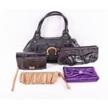 A Salvatore Ferragamo black leather handbag with a turquoise lined interior, numbered DY21 - 6305,