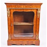 A Victorian walnut and ormolu mounted pier cabinet with inlaid decoration of floral sprays, the