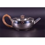 A Victorian or Edwardian silver teapot (hallmarks rubbed) of cylindrical form, with tapering spout