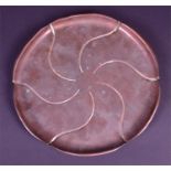 A W.A.S Benson copper tray of circular form design no.719, stamped to underside, c1900, 29 cm