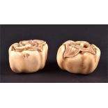 A near pair of finely carved 19th century Japanese carved ivory netsuke in the form of squashes /