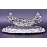 A Portuguese .833 standard silver jardiniere on mirror plateau Porto, post 1938, boat-shaped, the