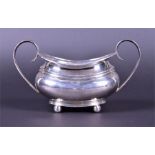 An Edward VII silver sugar bowl  by Barker Brothers, Chester, 1907, of rounded oblong form on four