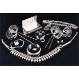 A small quantity of silver and white metal jewellery to include a bib collar necklace, three hair